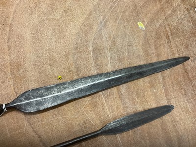 Lot 959 - Two antique African spears, together with an old African Lion spear tip. (3)