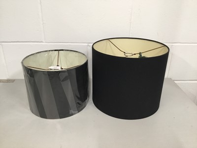 Lot 205 - Two black drum lamp shades, 25.5cm and 20.5cm high