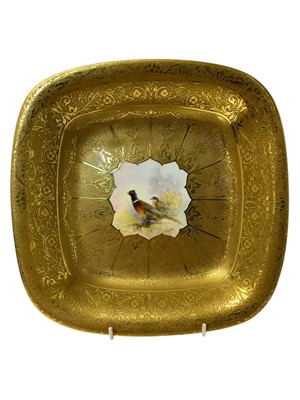 Lot 260 - Good quality Royal Worcester gilt and hand painted cabinet dish of rounded square form with richly gilded border and a central star shaped reserve painted with a pair of pheasants, signed D. R....