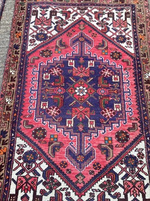 Lot 1424 - Pakistani carpet with stepped medallions and another similar