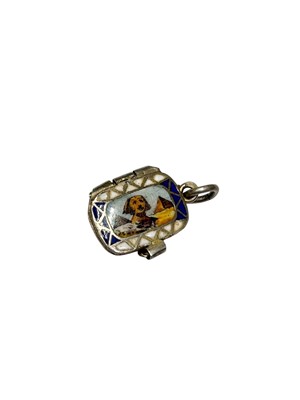 Lot 1005 - Egyptian revival silver (800) enamelled Moses basket pendant/ charm with gilt baby figure inside, 19mm long including suspension loop