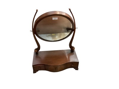 Lot 1207 - George III oval swing plate toilet mirror with serpentine base