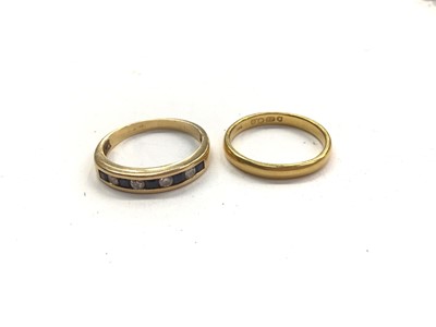 Lot 1072 - 18ct gold sapphire and diamond half eternity ring and 22ct gold wedding ring (2)