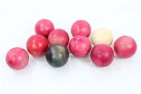 Lot 987 - Ten antique and stained ivory snooker balls,...