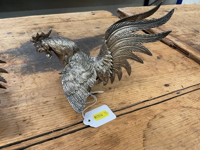 Lot 20 - Pair of white metal fighting cockerels