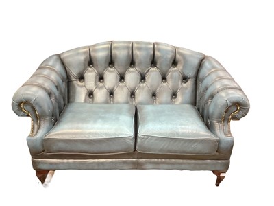 Lot 1202 - Leather chesterfield three seater sofa and two seater sofa (2)