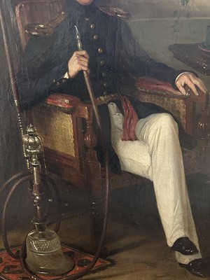 Lot 1286 - Attributed to George Duncan Beechey (1788-1852) oil on canvas - portrait of an Officer of the East India Company's Bengal Engineers, a cut glass hookah pipe at his side, in gilt frame. Pr...