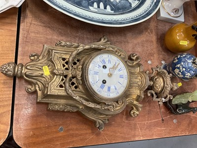 Lot 454 - Brass-cased cartel clock with key and pendulum