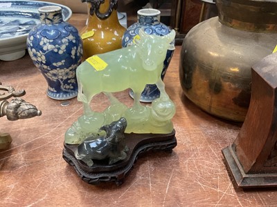 Lot 457 - Chinese jadeite/hardstone carving of a buffalo and calf on a carved hardwood stand