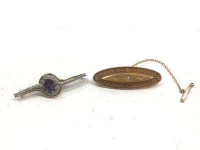 Lot 1036 - Victorian 15ct gold diamond set brooch (Birmingham 1893), together with a 9ct gold amethyst and diamond brooch (2)