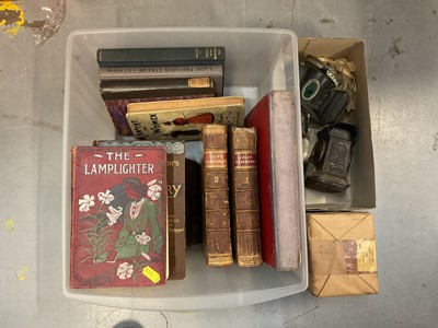 Lot 492 - Two vintage cycle lamps, a WWII lamp in original packaging (unopened), together with collection of antique books