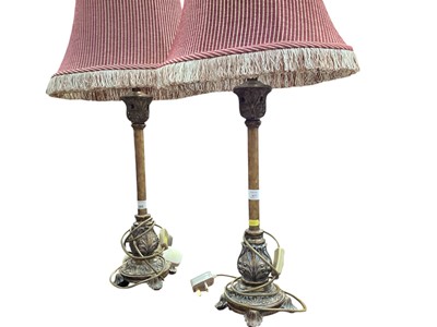 Lot 685 - Pair of gilt table lamps with acanthus leaf decoration, with fabric shades