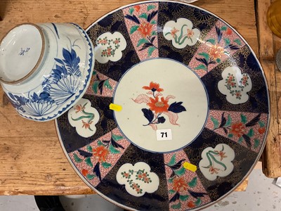 Lot 23 - Antique Japanese Imari porcelain charger, 40cm diameter, and an Oriental blue and white bowl (2)