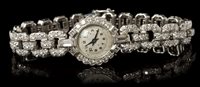 Lot 846 - Fine ladies' diamond bracelet Watches with...