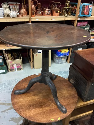 Lot 1240 - Georgian mahogany circular wine table with revolving birdcage support on cannon barrel colomn and tripod base . The top 74cm diameter