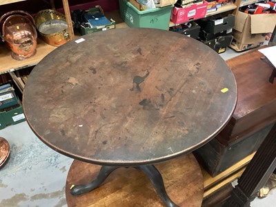 Lot 1240 - Georgian mahogany circular wine table with revolving birdcage support on cannon barrel colomn and tripod base . The top 74cm diameter