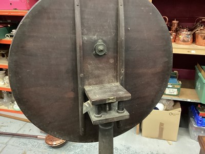 Lot 1240 - Georgian mahogany circular wine table with revolving birdcage support on cannon barrel colomn and tripod base . The top 74cm diameter
