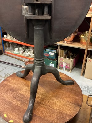 Lot 1240 - Georgian mahogany circular wine table with revolving birdcage support on cannon barrel colomn and tripod base . The top 74cm diameter