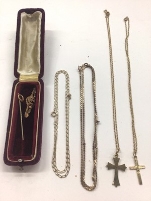 Lot 1041 - Four 9ct gold chains, two 9ct gold cross pendants, Victorian 9ct gold brooch and 9ct gold wishbone on metal stick pin