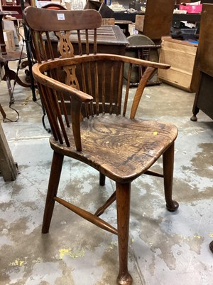 Lot 1242 - Early 19th century Windor yew and elm stick back elbow chair on tapered legs and pad feet together with another antique chair (2)