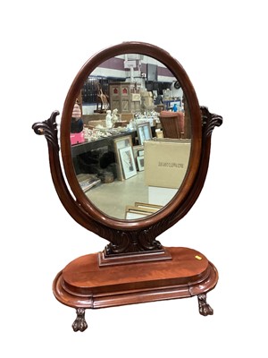 Lot 1246 - Impressive Victorian mahogany toilet mirror with oval plate, stepped plateau with drawer raised on paw feet, 93cm high