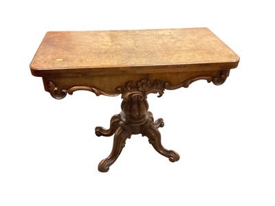 Lot 1296 - Victorian walnut card table with foldover top on reeded support and four splayed legs, 91.5cm wide