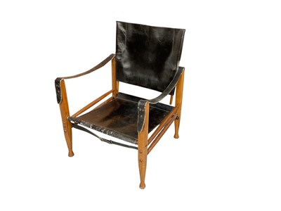 Lot 1271 - After Kaare Klint, vintage black leather safari chair, 78cm high x 57cm wide