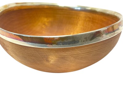Lot 399 - Wooden mazer bowl with silver rim