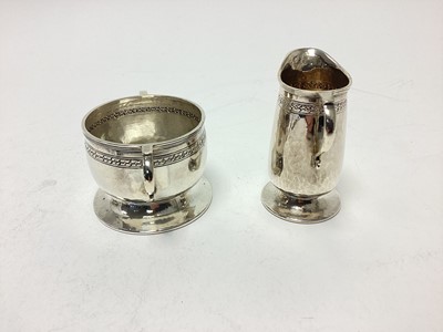 Lot 272 - Liberty and Co silver cream jug and ensuite sugar bowl...