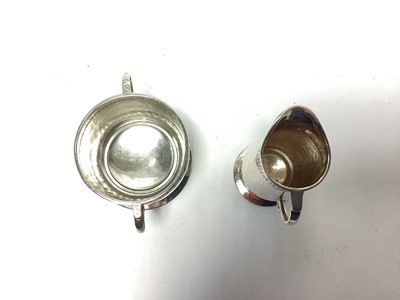 Lot 272 - Liberty and Co silver cream jug and ensuite sugar bowl...