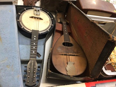 Lot 320 - Group of vintage telephones, vintage radio, Astral Varipower telescope and wooden tripod in box, banjo and mandolin, both cased and other items