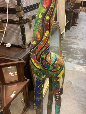 Lot 8 - Very decorative carved and painted wooden giraffe, approximately 150cm high