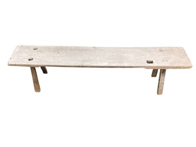 Lot 1353 - 19th century weathered rustic oak bench 173cm wide, 30cm deep, 38.5cm high