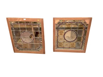 Lot 1355 - Two Victorian leaded and stained glass panels in oak frames 76 x 68cm