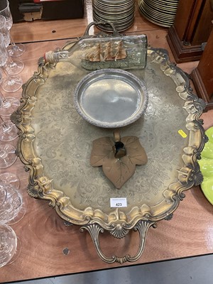 Lot 424 - Large Victorian silver plated serving tray together with a ship in a bottle, Tudric pewter comport and an Arts and Crafts chamberstick (4).