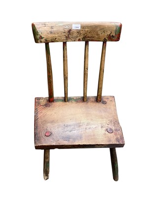 Lot 1364 - 19th century rustic elm stick back chair with solid seat with traces of painted decoration