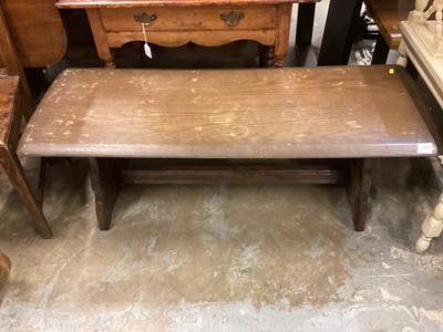 Lot 1352 - Ercol elm coffee table on end standards 120cm