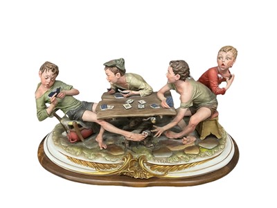 Lot 231 - Large Capodimomnte porcelain figure group 'The cheaters' together with a collection of capodimonte and similar figures