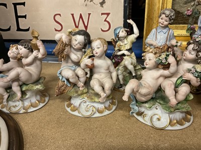 Lot 231 - Large Capodimomnte porcelain figure group 'The cheaters' together with a collection of capodimonte and similar figures