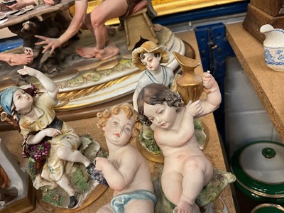 Lot 231 - Large Capodimomnte porcelain figure group 'The cheaters' together with a collection of capodimonte and similar figures