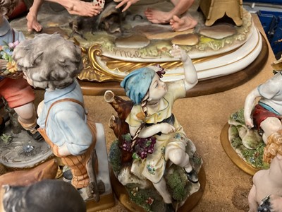 Lot 231 - Large Capodimomnte porcelain figure group 'The cheaters' together with a collection of capodimonte and similar figures