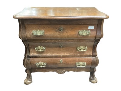 Lot 1372 - Early 20th century Dutch dwarf oak chest of three drawers on paw feet 65cm wide, 59cm high, 34cm deep