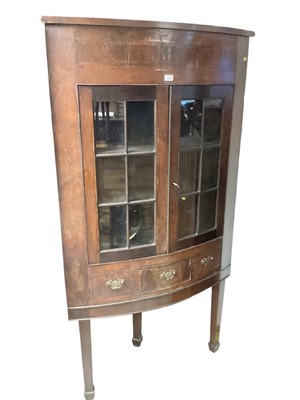 Lot 1373 - 19th century mahogany bowfront corner cabinet with glazed drawers and drawer on square taper legs