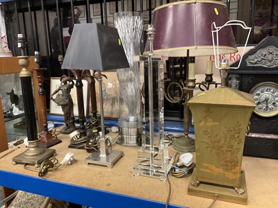 Lot 229 - Group of table lamps to include a tôleware style lamp, a pair of bronze palm tree lamps etc