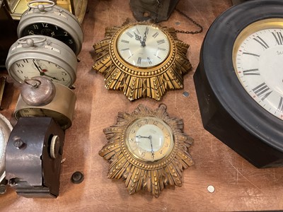 Lot 486 - Two Smiths sunburst wall clocks.