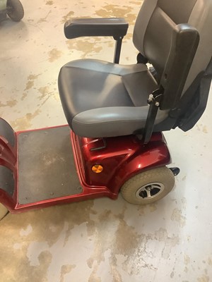 Lot 4 - Red mobility scooter with key,cover and charger