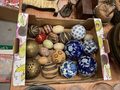 Lot 524 - Group of modern blue and white carpet bowls, hardstone eggs and sundries (1 box).