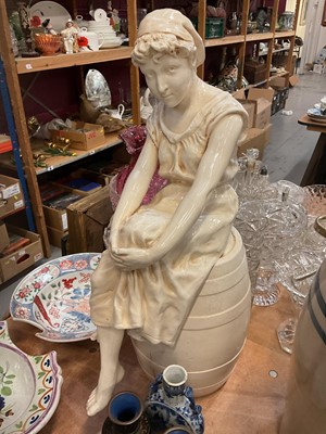 Lot 530 - Large ceramic figure of a lady sitting on a barrel