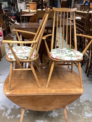 Lot 1412 - Ercol drop leaf table, 114cm x 124cm, together with a set of four chairs comprising two carvers and two standards