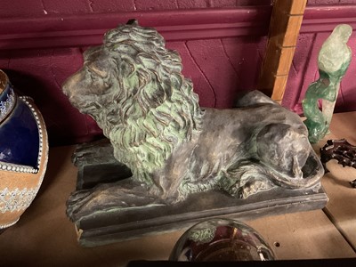 Lot 759 - Terracotta model of a recumbent lion